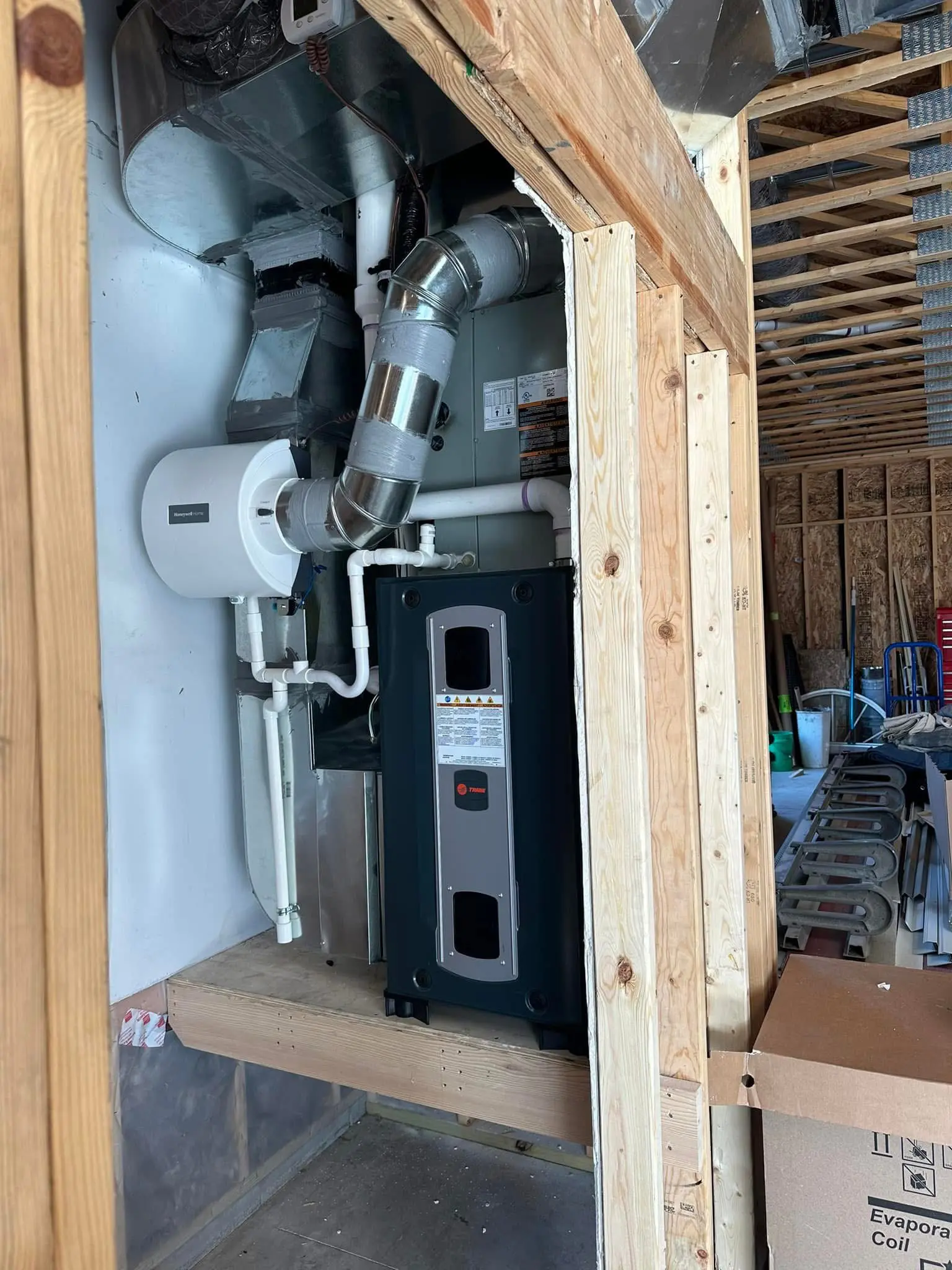 Furnace and ductwork in unfinished utility room
