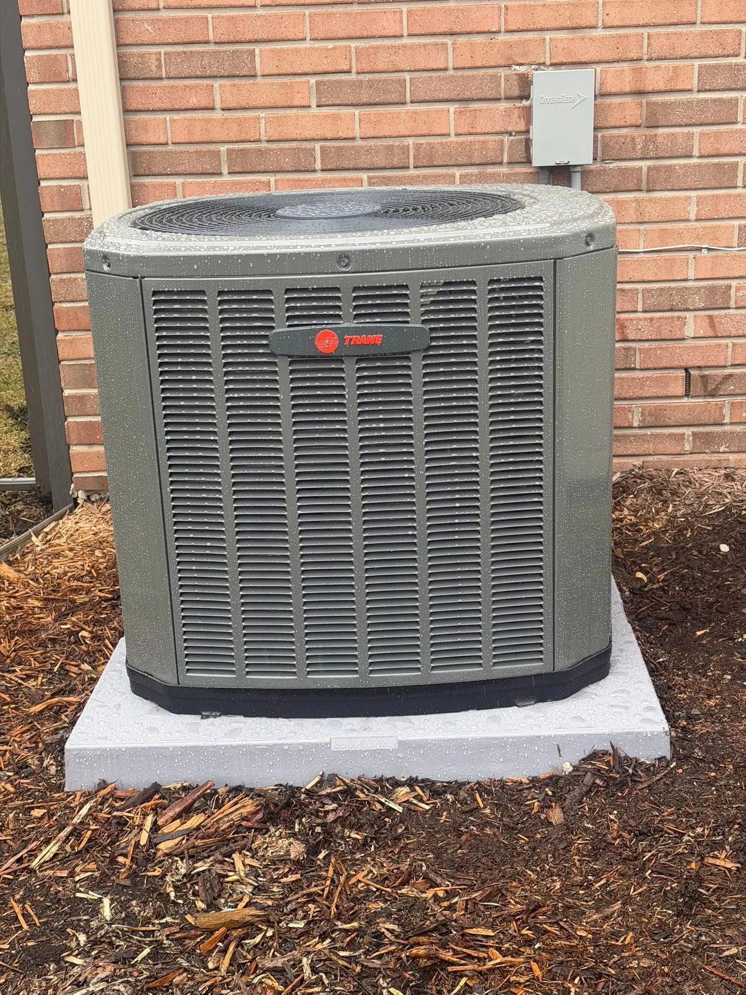 Gray Trane outdoor air conditioning unit