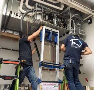 Tocco technician performing furnace maintenance